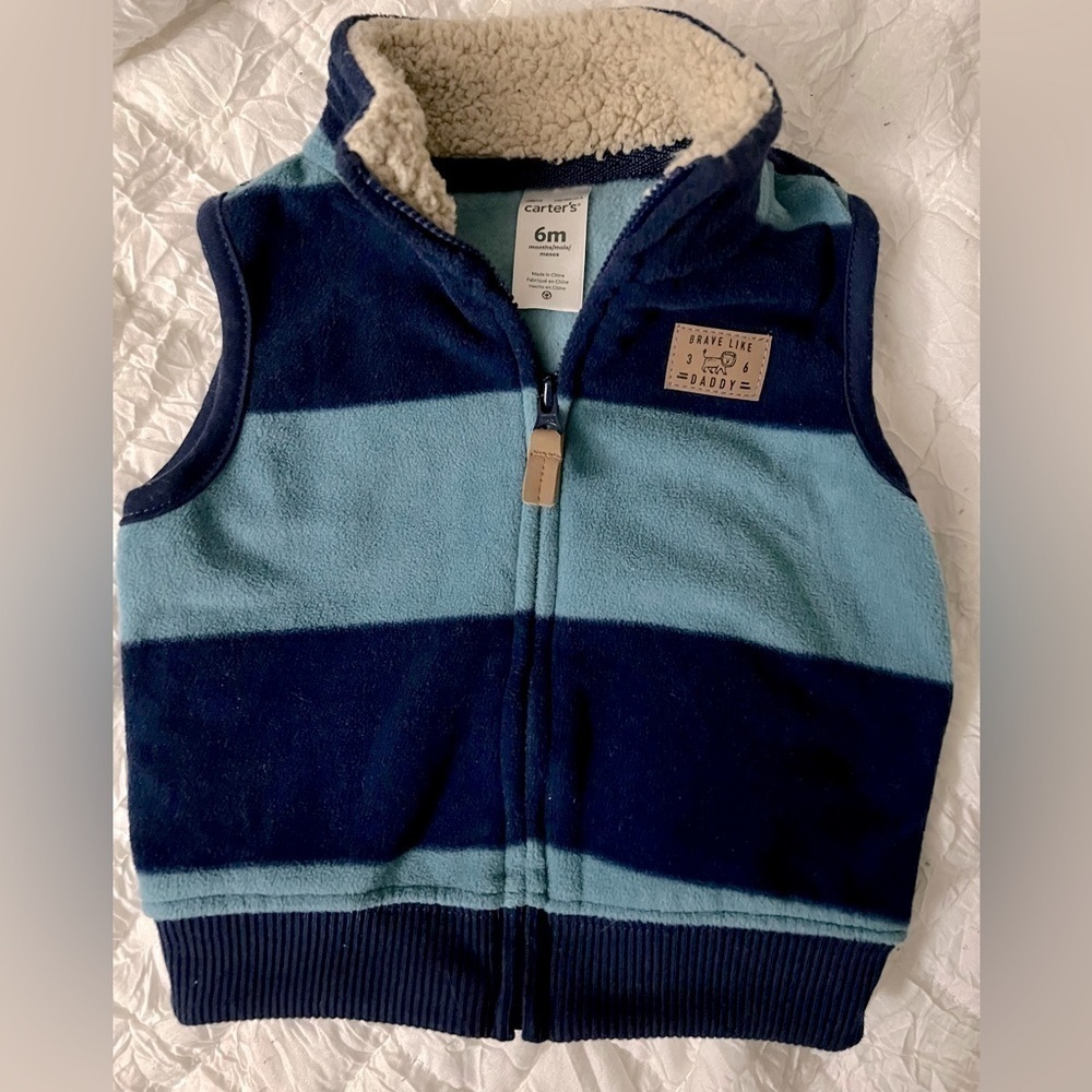 Two toned blue Fleece kids vest. Size 6m Carters brand. Full front zipper